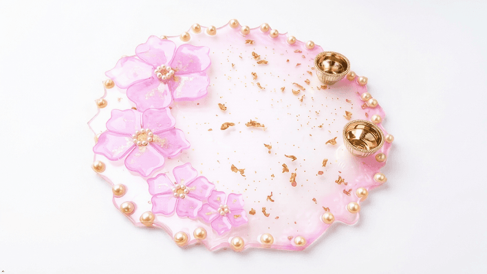 Handcrafted Resin Decorative Round Thali with Floral & Pearl Embellishments – 12 Inch Handcrafted Resin Decorative Round Thali with Floral & Pearl Embellishments – 12 Inch