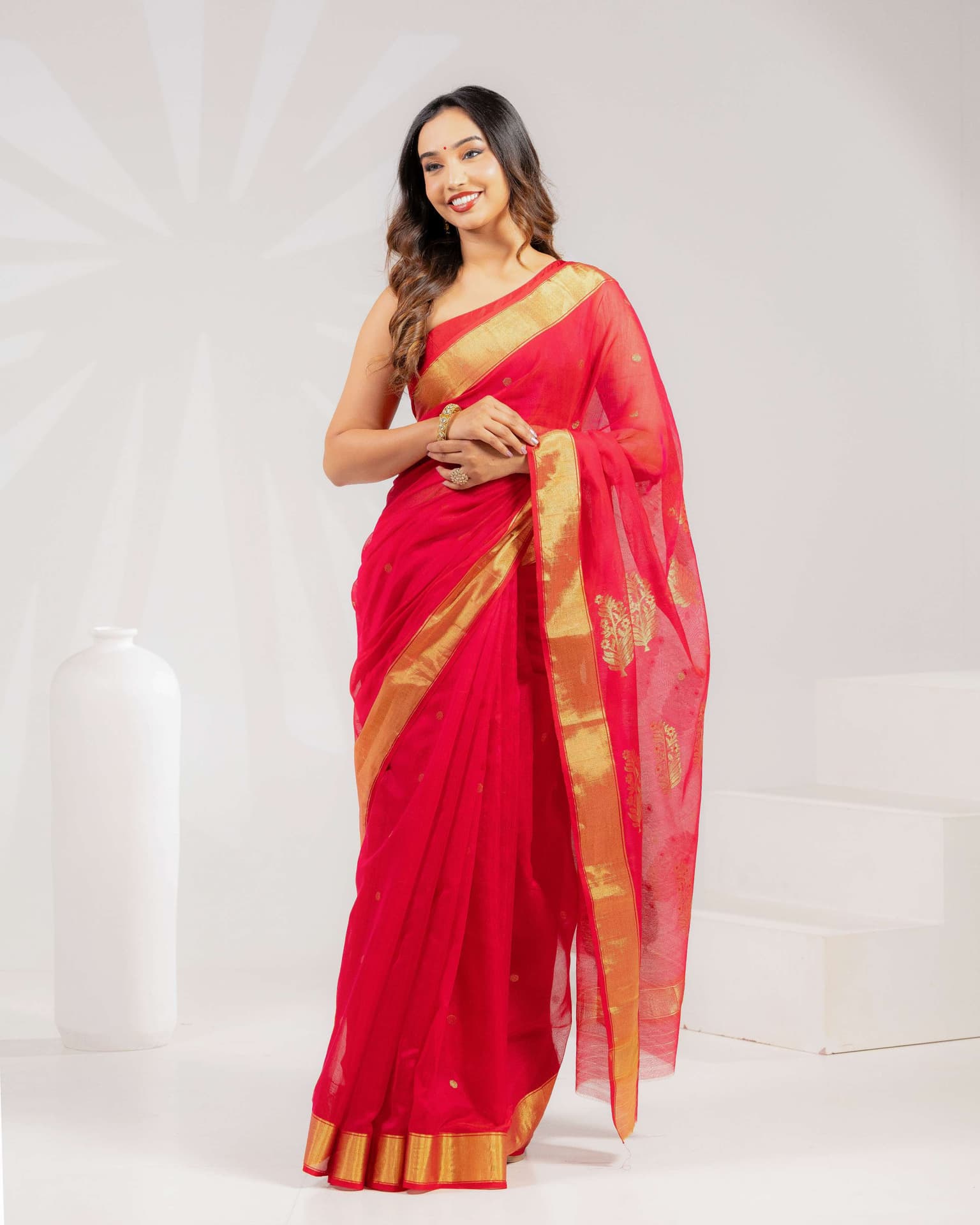 Crimson Red Handwoven Chanderi Silk Saree with Gold Zari Pankhi Motifs Crimson Red Handwoven Chanderi Silk Saree with Gold Zari Pankhi Motifs
